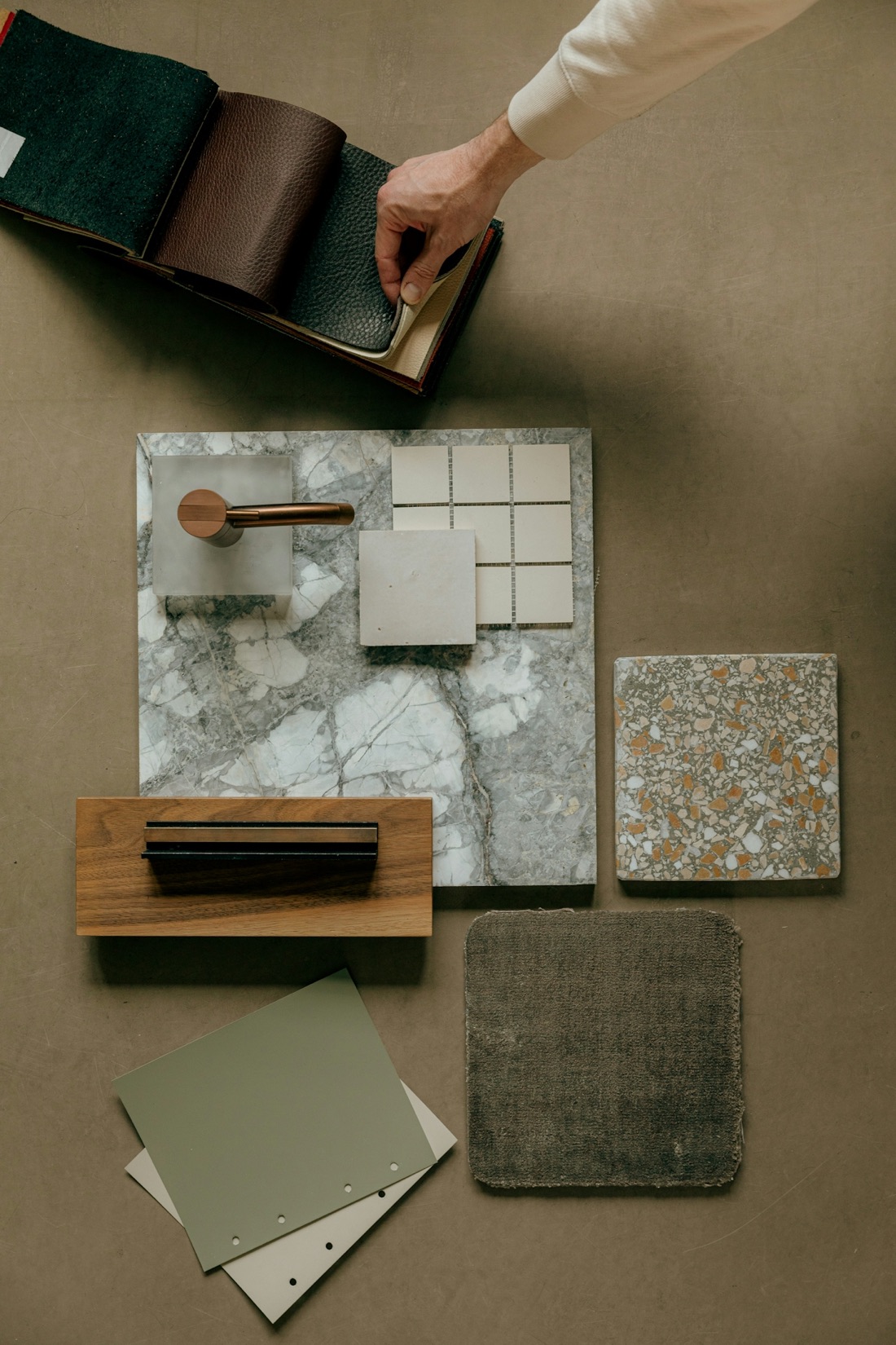 Material and finish palette — marble, wood, tile, and textile samples